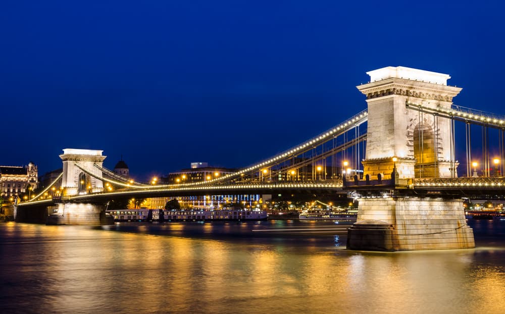 The Szechenyi Chain Bridge is a suspension bridge that spans the River Danube of Budapest