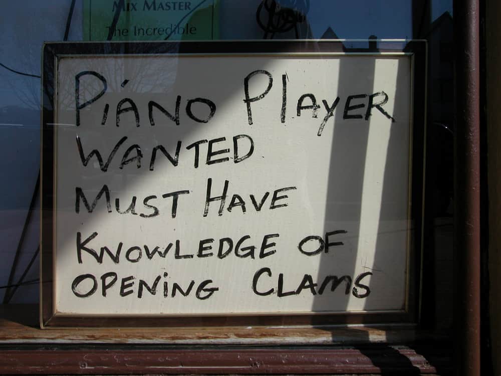 Funny sign for hiring piano player